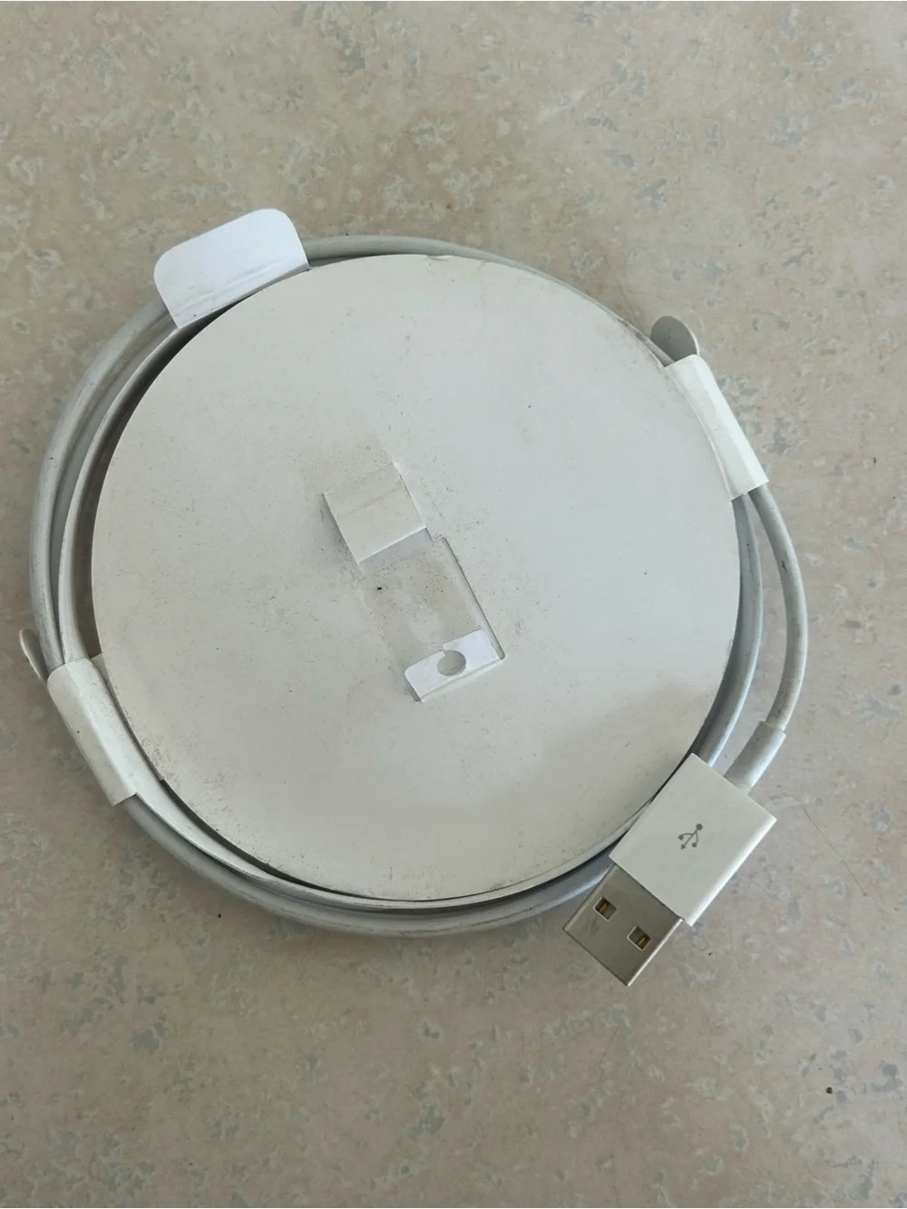 Round Apple Watch charger White